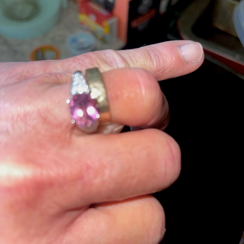 14k solid white gold.size 7.5. Pink topaz and Diamond ring.